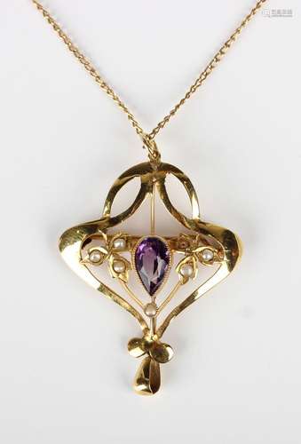 A gold, amethyst and seed pearl pendant brooch, mounted with...