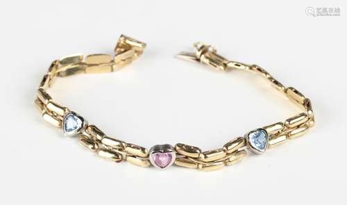 A 9ct gold, synthetic blue spinel and pink sapphire bracelet...