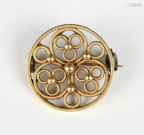 An early 20th century gold circular brooch by Mrs Newman, wi...