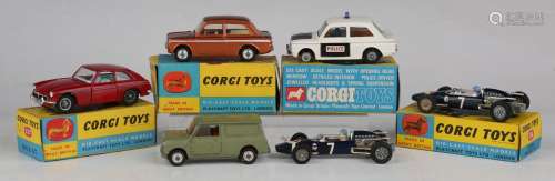 Four Corgi Toys cars, comprising No. 506 Police Panda Imp, N...