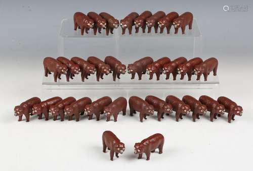 Thirty-two Crescent Toys lead figures of brown bears.