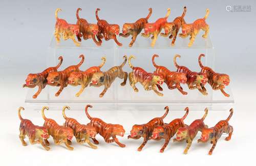 Twenty-three Crescent Toys lead figures of tigers (some surf...