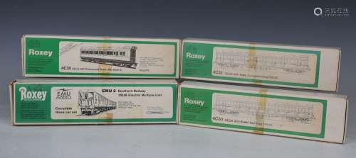 A small collection of metal locomotive kits, including an Al...