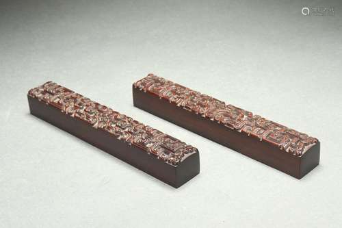 A Pair Red Sandalwood Paperweights