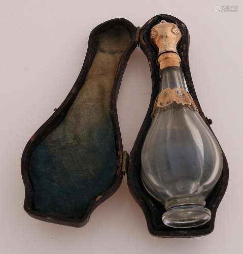 Odeur bottle with golden cap