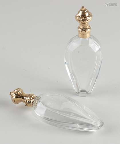 Two odor bottles with gold caps