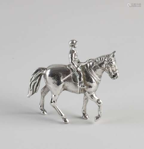 Silver horse with rider