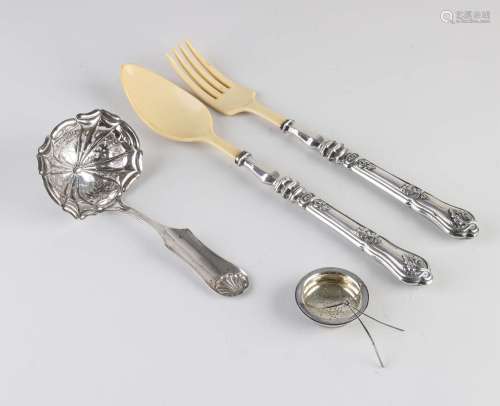 Silver sugar caster, salad cutlery and tea strainer