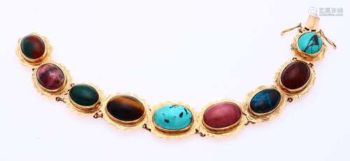 Gold bracelet with gemstones