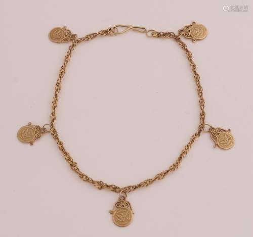 Gold bracelet with coins