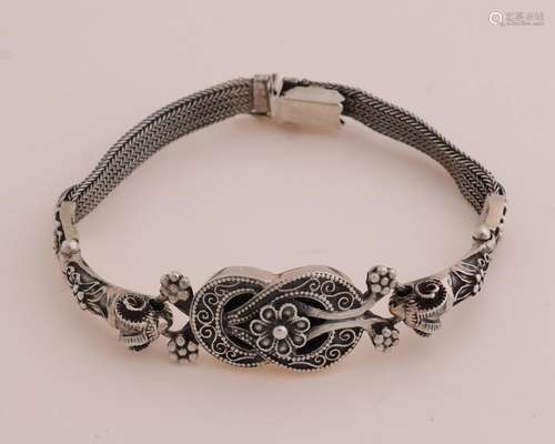 Silver bracelet, ram's heads