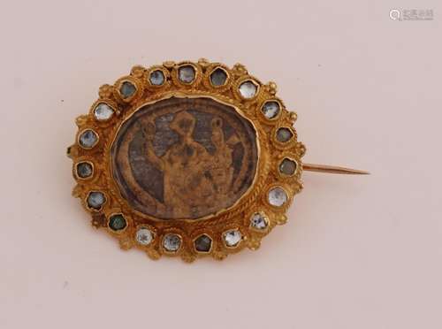 Gold regional brooch