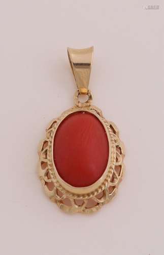 Gold pendant with red coral