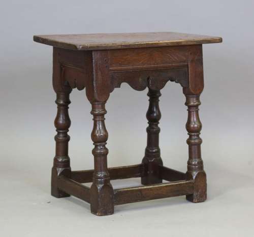 An Elizabeth I oak joint stool, circa 1600, the single-piece...