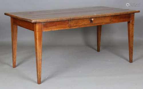 A 19th century French cherry farmhouse table, the four-plank...