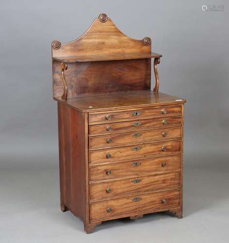 An early 19th century mahogany collector's chest, the raised...