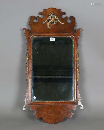 An early 20th century George III style walnut and parcel gil...