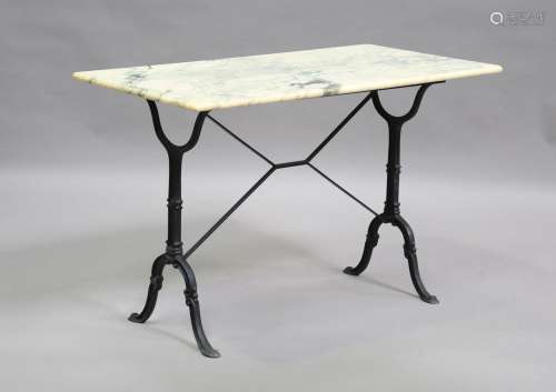 A 20th century French cast iron and marble-topped table, rai...