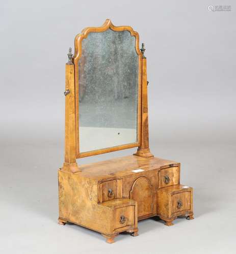 An early 20th century Queen Anne style walnut dressing table...