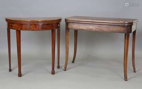 A George IV figured mahogany fold-over tea table with crossb...