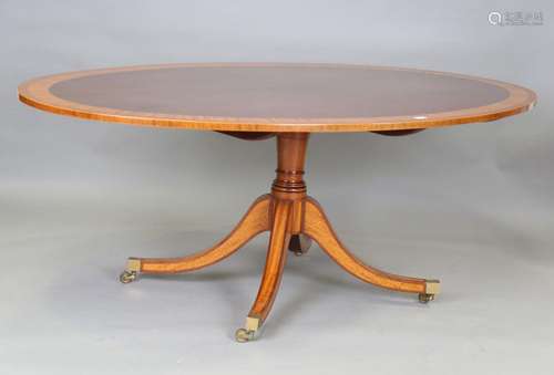 A modern reproduction mahogany oval dining table by William ...