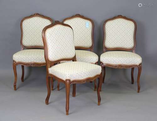 A set of four early 20th century French walnut showframe din...