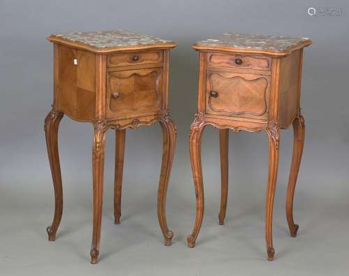 A near pair of late 19th century French walnut bedside cabin...