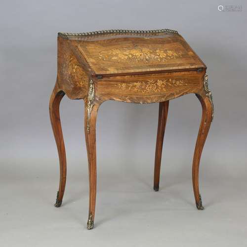 A late 19th century Louis XV style rosewood and foliate inla...