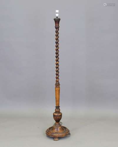 A 20th century painted faux walnut barleytwist lamp standard...