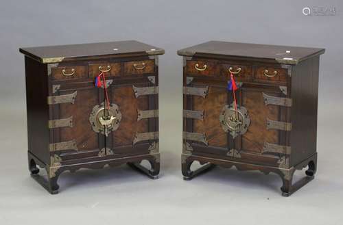 A pair of late 20th century Korean elm and gilt metal mounte...