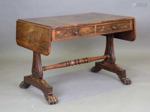 A fine Regency rosewood sofa table, in the manner of Gillows...