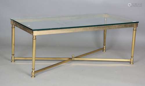 A late 20th century gilt brass framed coffee table with a he...