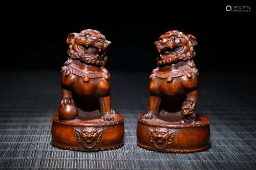 Pair of Chinese Huangyang Wood Carved Lions