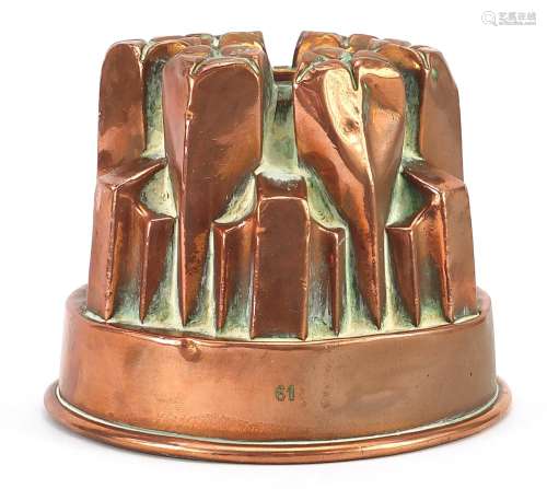 Victorian copper jelly mould numbered 61, 11cm high