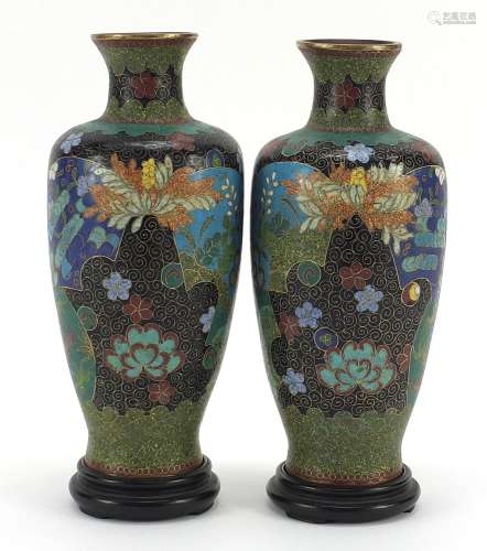 Pair of Japanese cloisonne vases on hardwood stands, each en...