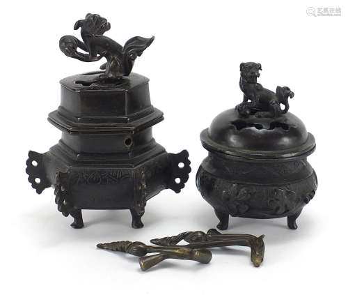 Two Japanese patinated bronze tripod incense burners and cov...