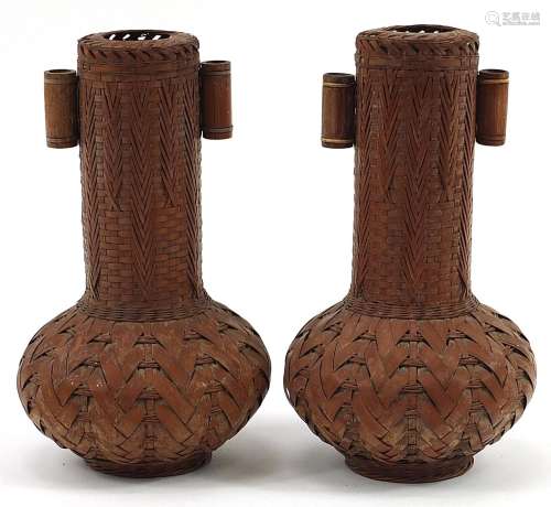 Pair of Japanese woven ikebana basket vases with twin handle...