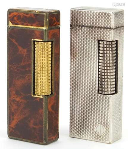 Two Dunhill pocket lighters including a faux tortoiseshell e...