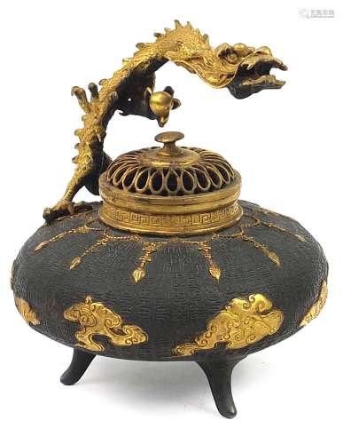 Chinese partially gilt patinated bronze tripod incense burne...