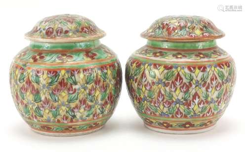 Pair of Chinese porcelain vases and covers hand painted with...