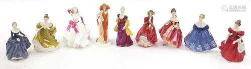 Nine collectable figurines including Royal Doulton and Coalp...