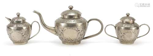 Anglo Indian white metal three piece tea service embossed wi...