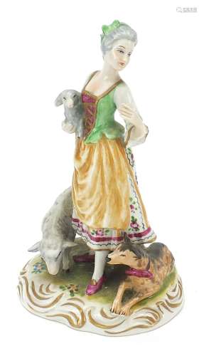 Continental porcelain figure group of a lady with dog and la...
