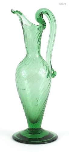 Antique green glass ewer with writhen body, 20.5cm high