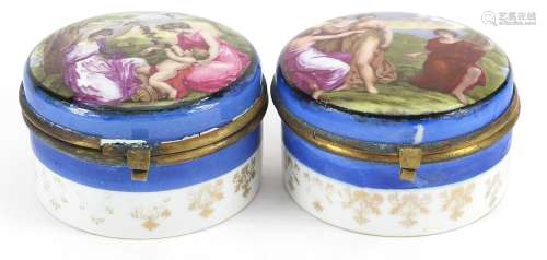 Pair of continental porcelain boxes with hinged lids decorat...