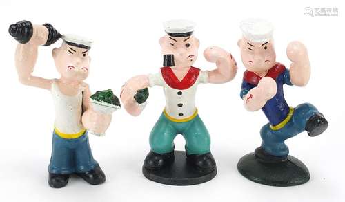 Three painted cast iron figures of Popeye, the largest 16cm ...