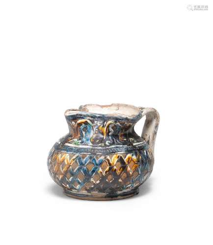 An Italian incised slipware jug, probably Veneto, perhaps Pa...