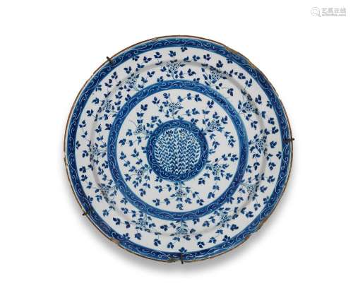 A large Dutch Delftware charger, early 18th century