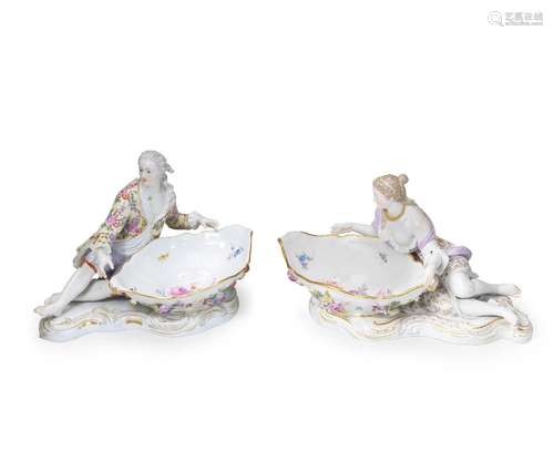 【*】A pair of large Meissen figures with sweetmeat dishes, la...