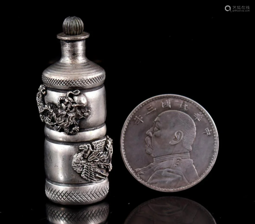 Silver coin and silver plated snuf bottle